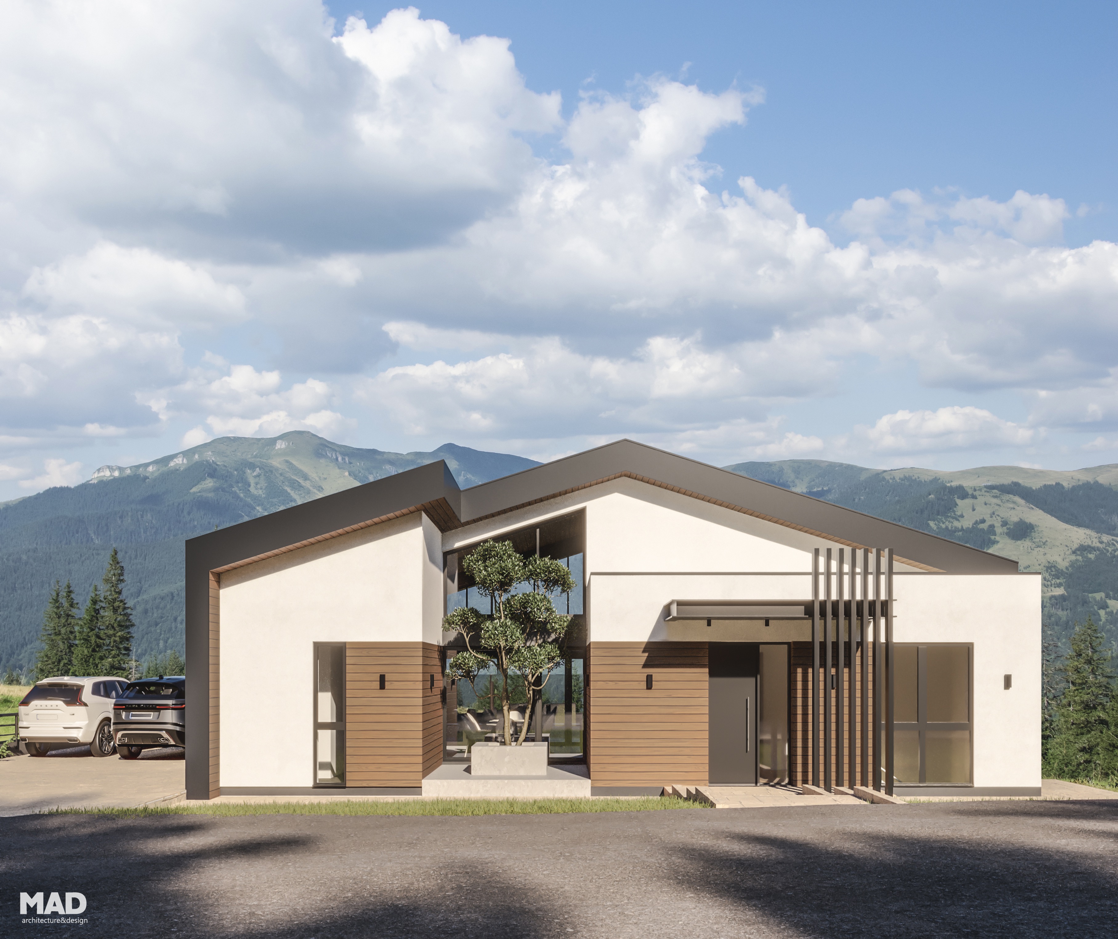 Vedere frontală a casei moderne de vacanță proiectate de MAD architecture&design, cu acoperiș în două ape, placaj de lemn și tencuială albă, amplasată la munte.