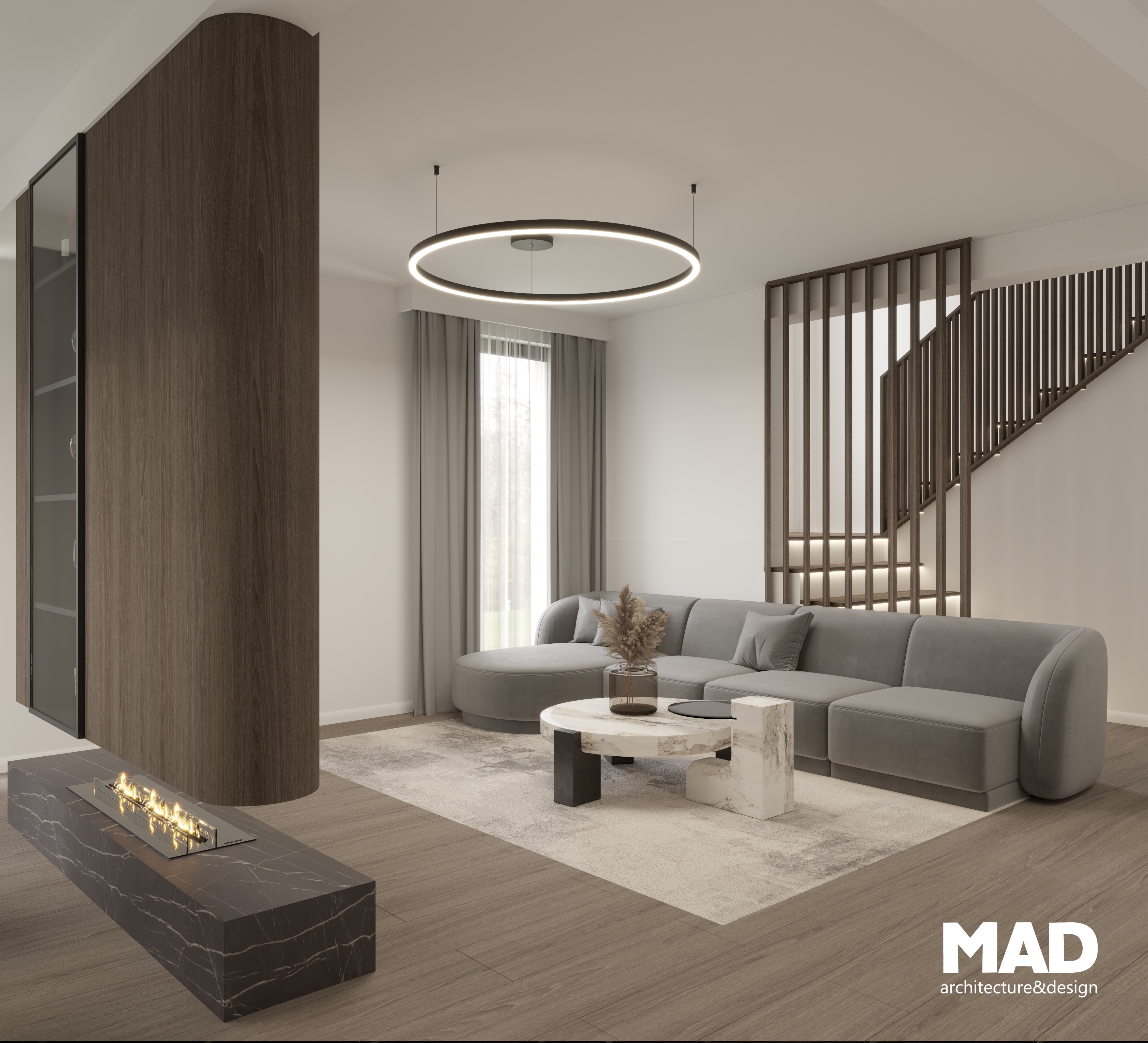 Zonă de living contemporană cu șemineu din marmură neagră, canapea gri și accente calde, design MAD architecture&design.