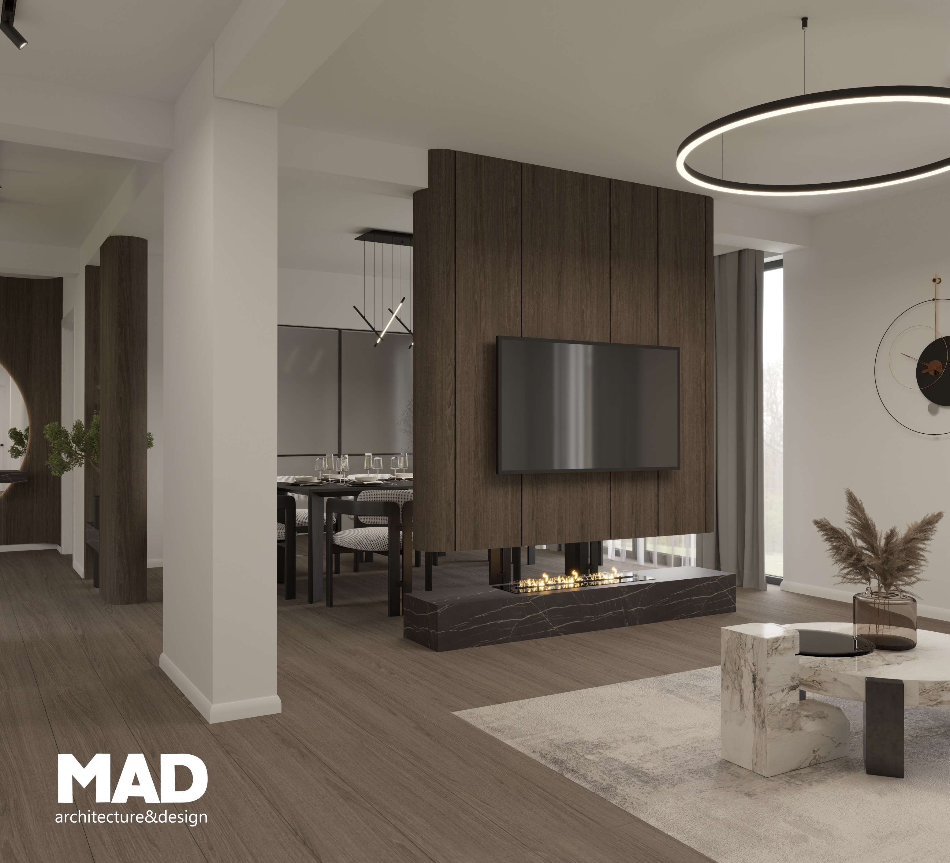 Amenajare living cu canapea modulară, măsuță din piatră naturală și iluminat circular suspendat, design elegant de MAD architecture&design.