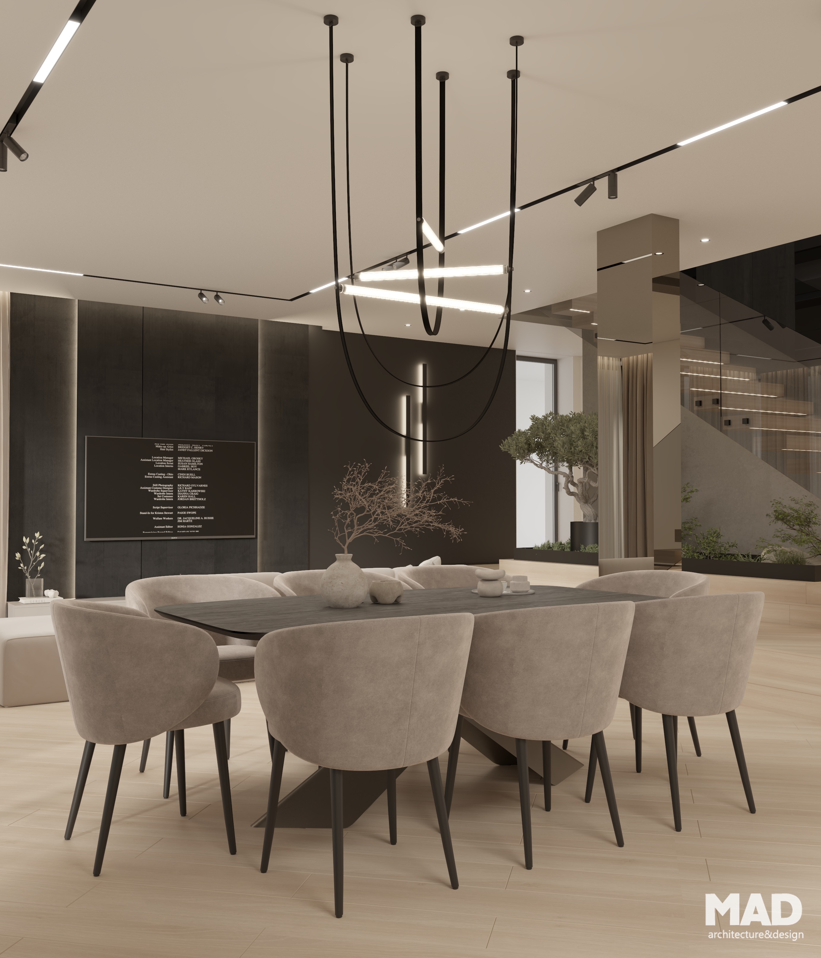 Zonă de dining elegantă cu masă neagră și scaune tapițate bej, sub un candelabru sculptural modern, proiect MAD architecture&design.