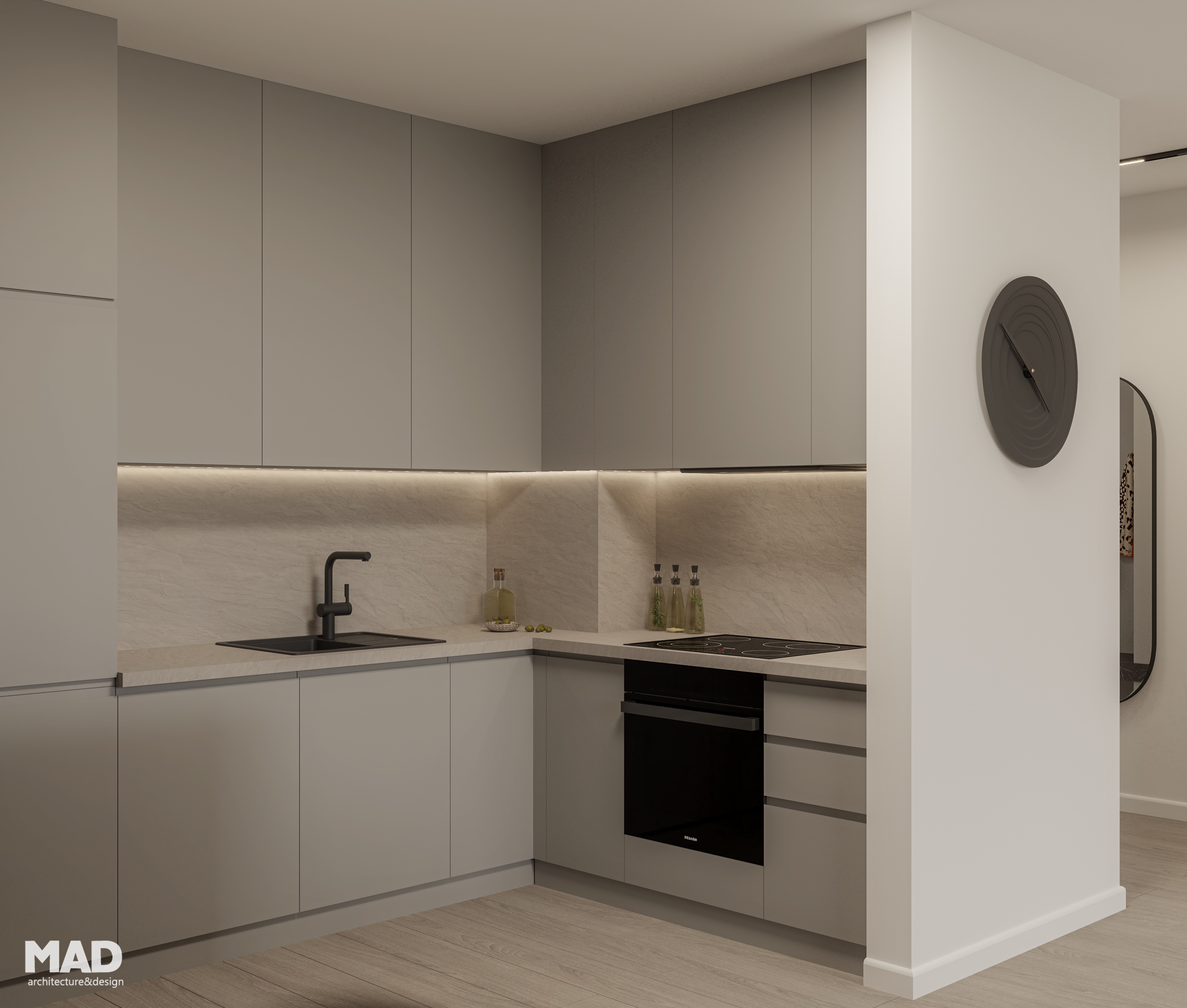 Bucătărie contemporană cu fronturi gri mat, blat compozit și accente negre, proiectată de MAD architecture&design într-un design minimalist și funcțional.