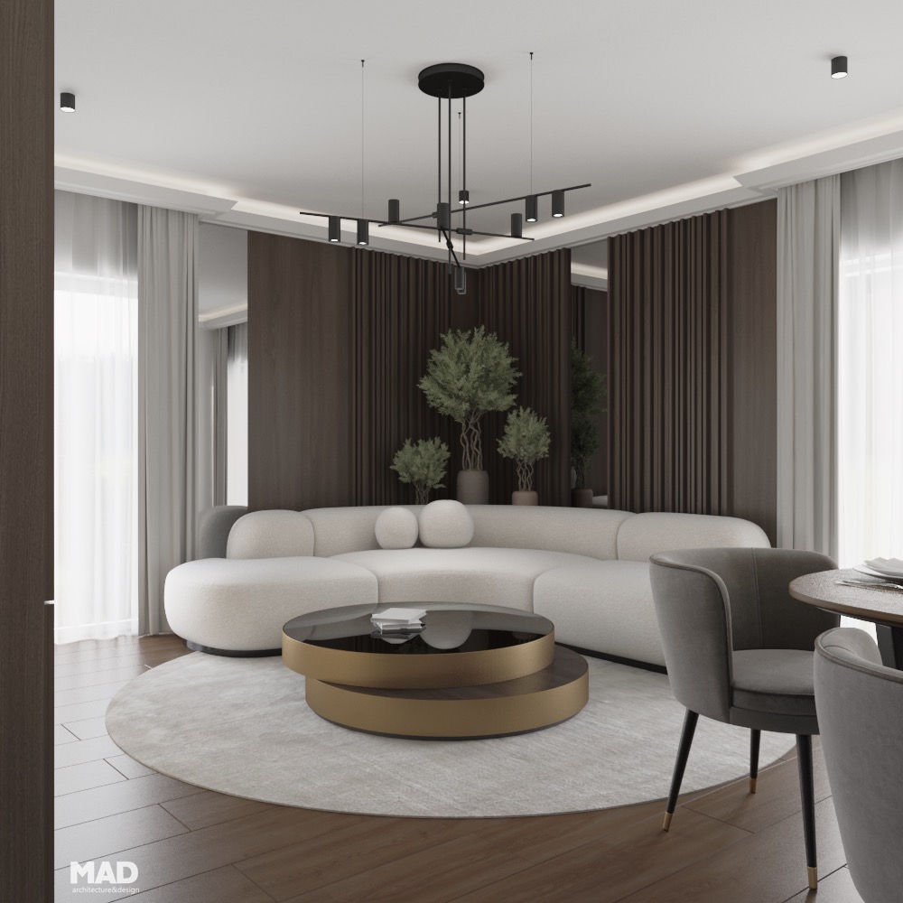 Living sofisticat cu măsuțe rotunde în finisaj negru lucios și auriu, completat de o canapea sculpturală bej, design MAD architecture&design.