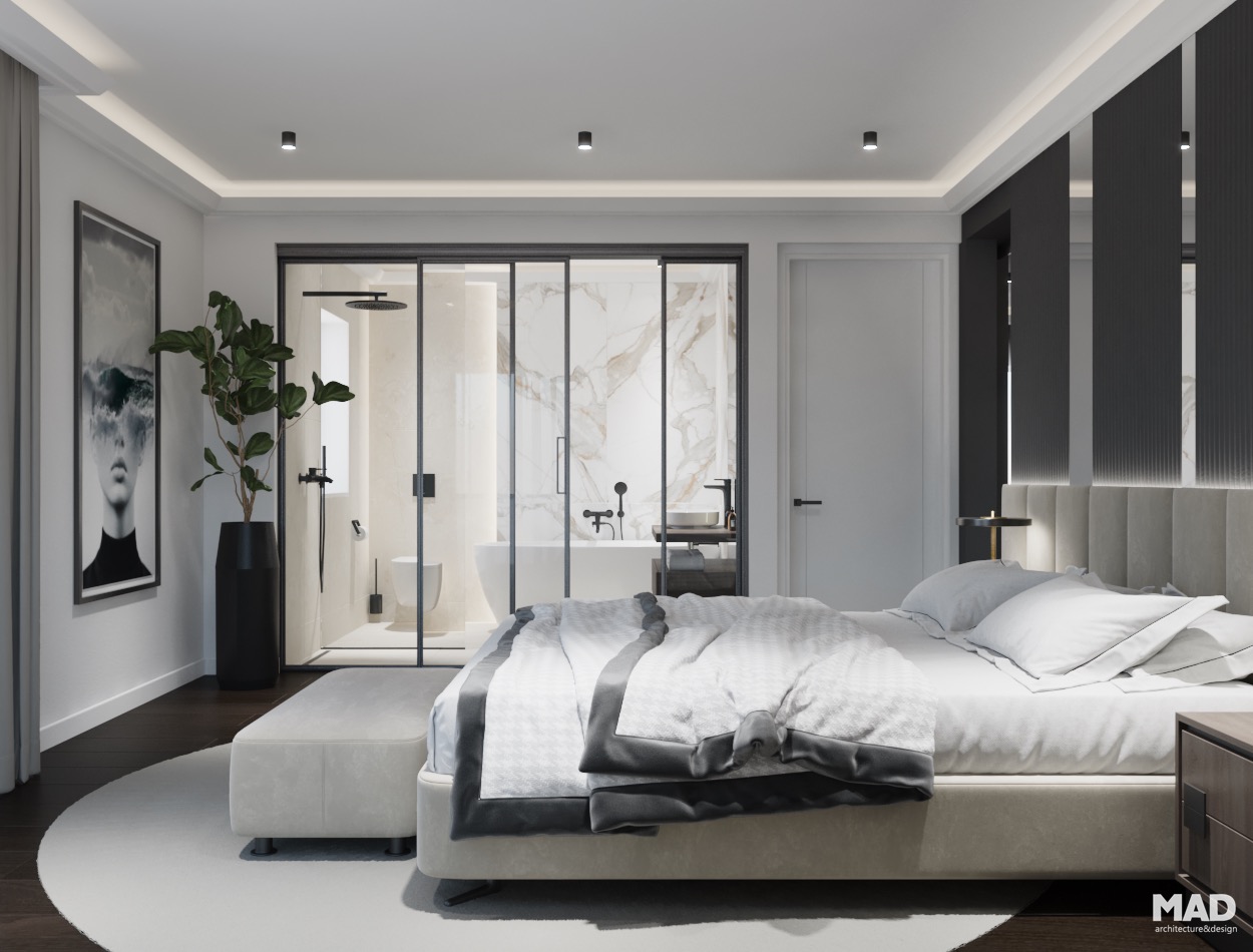 Dormitor luxury cu baie integrată din sticlă și finisaje din marmură naturală, concept premium MAD architecture&design.