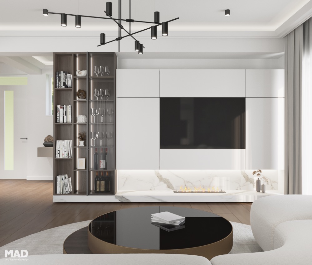 Living luxury cu șemineu decorativ, placare din marmură și mobilier custom made, proiect de interior realizat de MAD architecture&design.