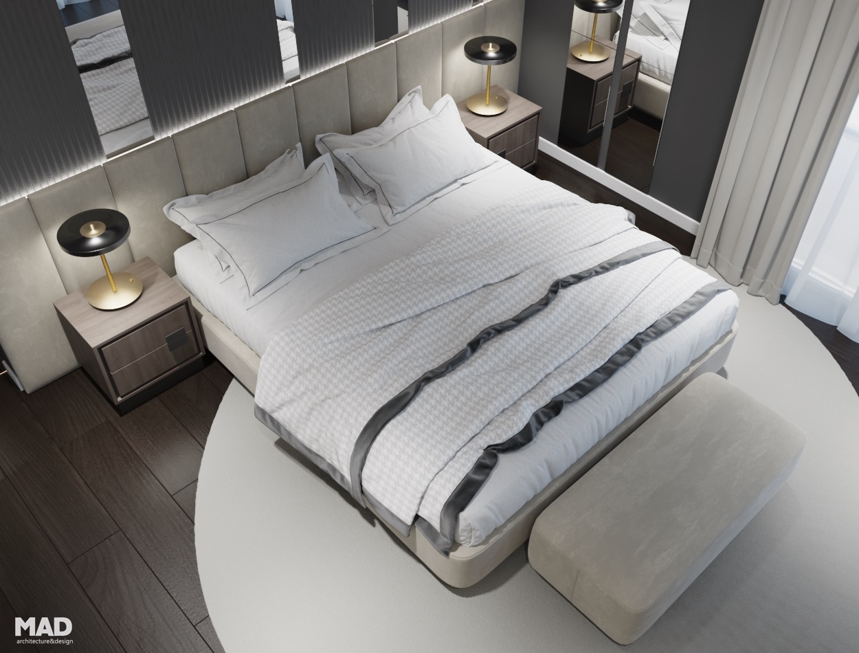 Vedere de ansamblu asupra dormitorului matrimonial luxury, cu pat tapițat, finisaje premium și paletă cromatică elegantă, design MAD architecture&design.